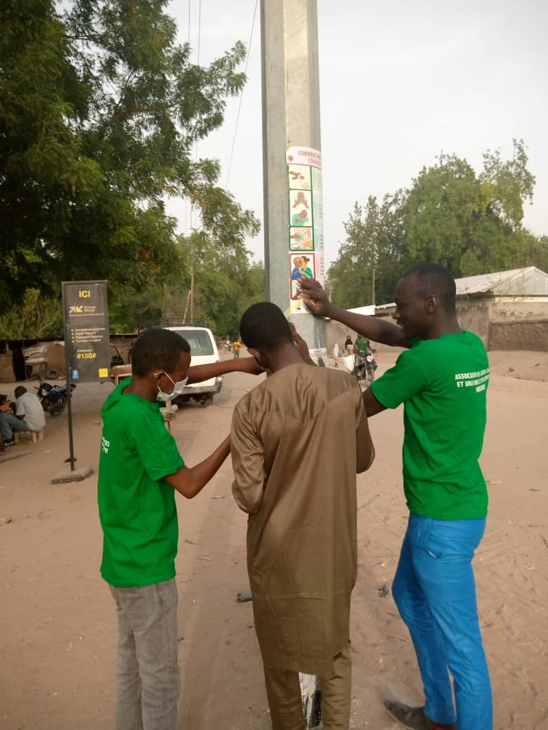 Campagne de sensibilisation et de distribution des masques faciaux pour la prévention de covid 19 - Photo 4