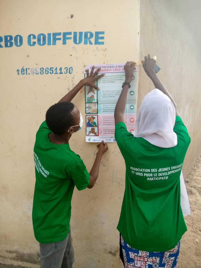 Campagne de sensibilisation et de distribution des masques faciaux pour la prévention de covid 19 - Photo 5